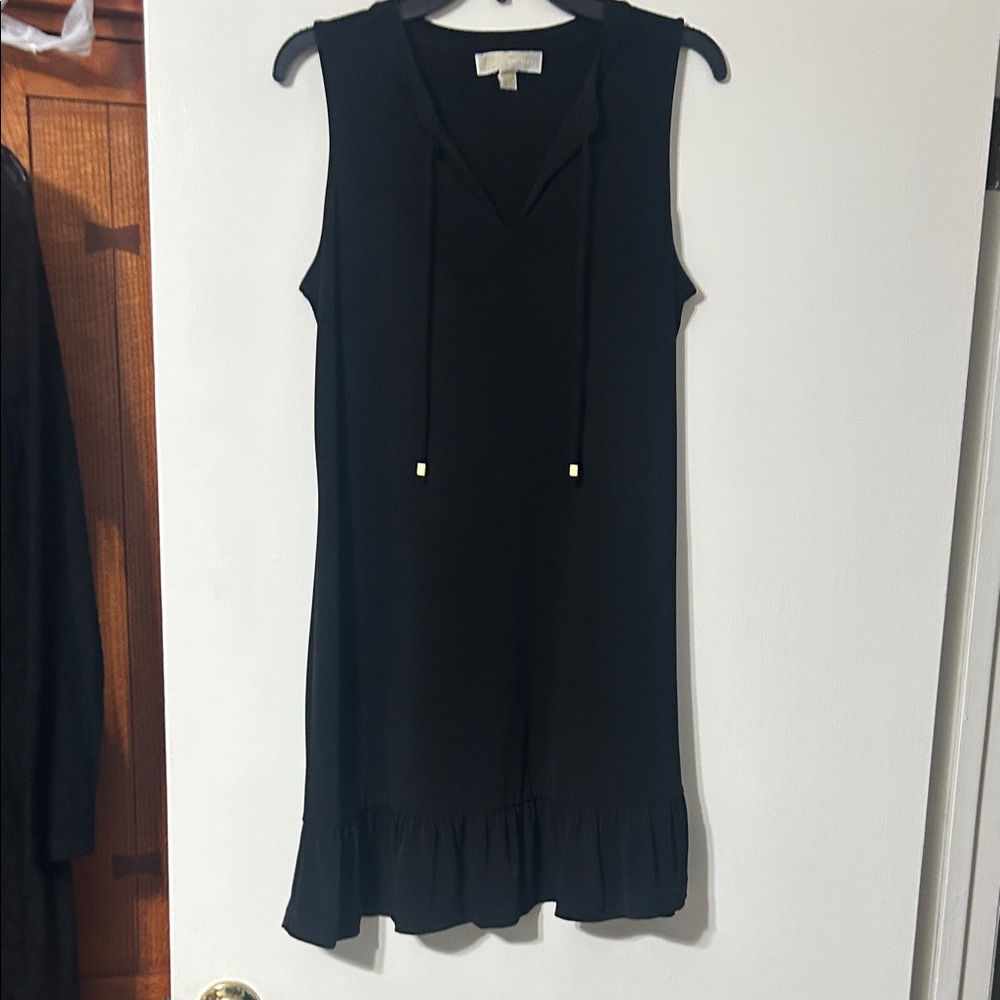 Michael Kors Black Dress - sleeveless with ruffled bottom.  Dressy or Casual.